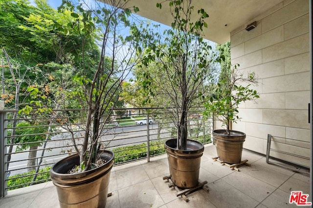 view of patio / terrace with a balcony