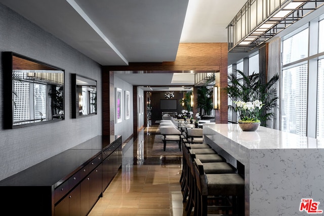 kitchen featuring dark brown cabinetry