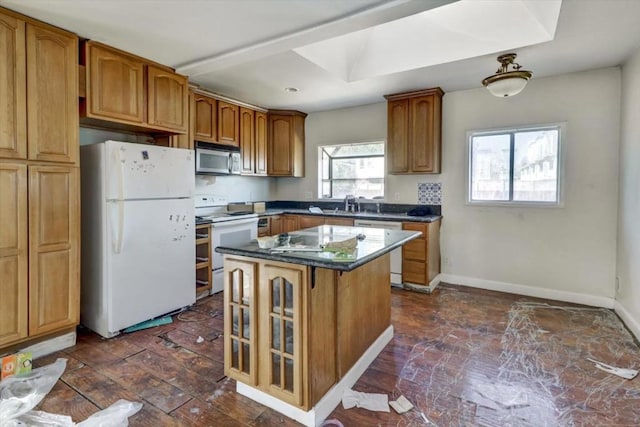 kitchen featuring white appliances and a center island