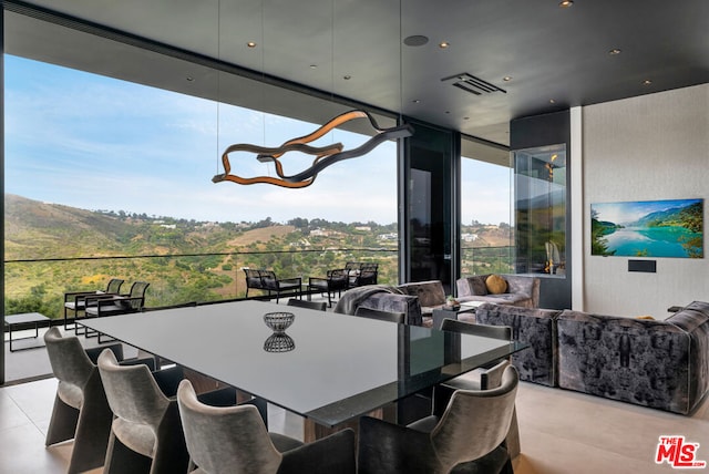 dining space featuring a mountain view