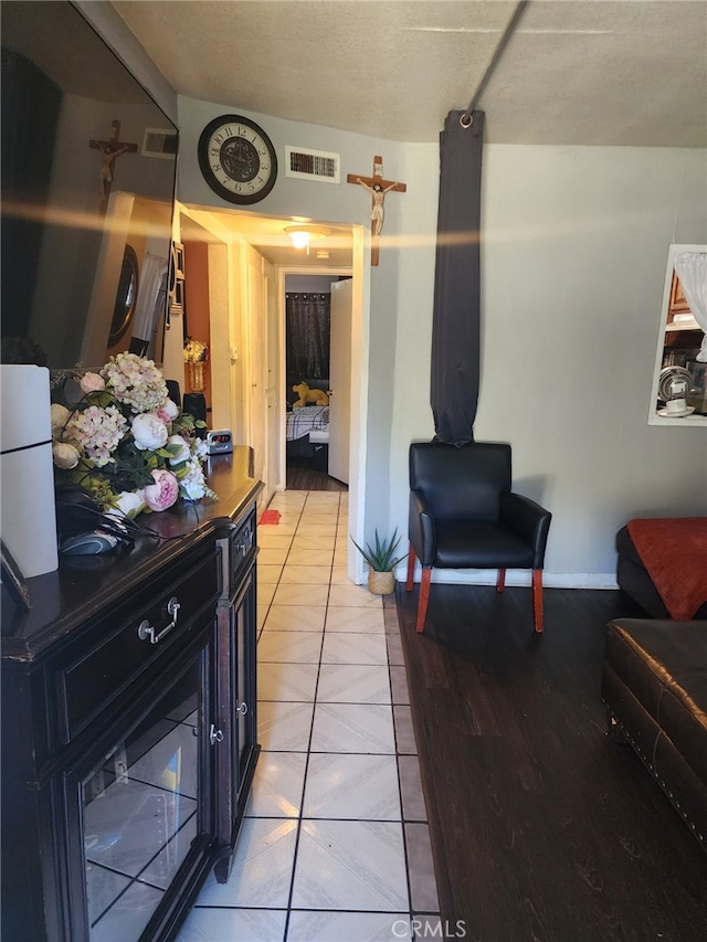 living room featuring light tile patterned flooring