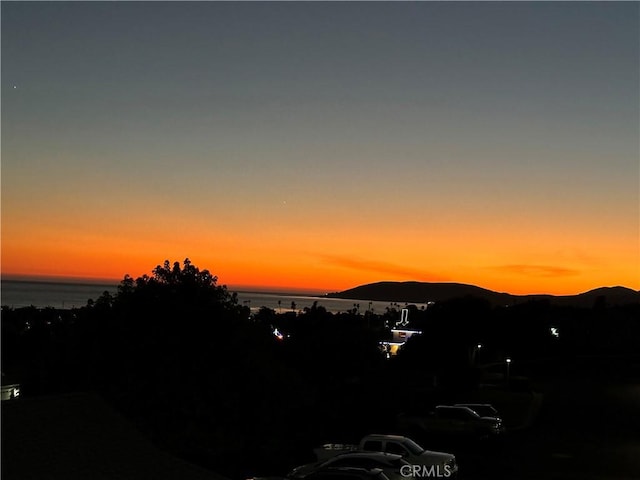 property view of mountains featuring a water view