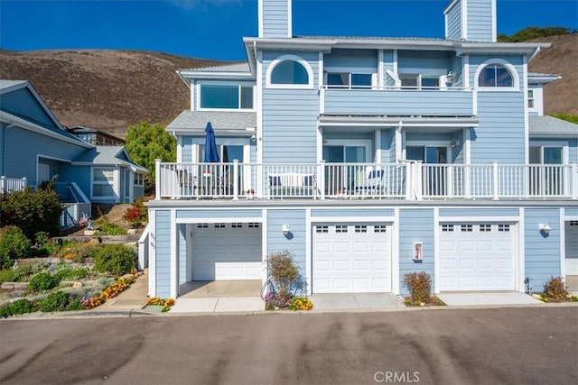 view of front of home featuring a mountain view