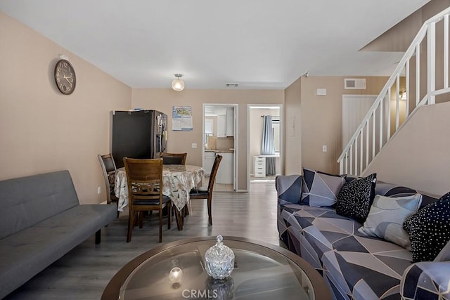 living room with hardwood / wood-style floors