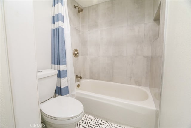 bathroom with toilet and shower / bathtub combination with curtain