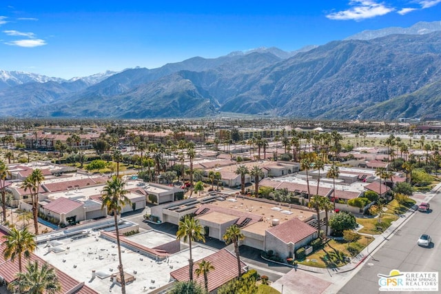 drone / aerial view featuring a mountain view