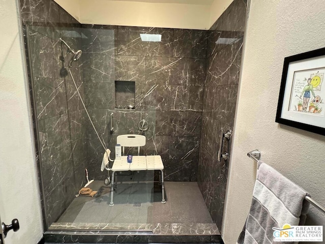 bathroom featuring tiled shower