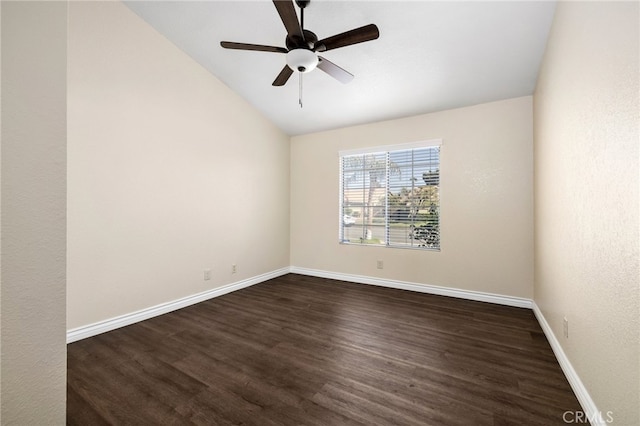 unfurnished room featuring lofted ceiling, dark wood-type flooring, and ceiling fan