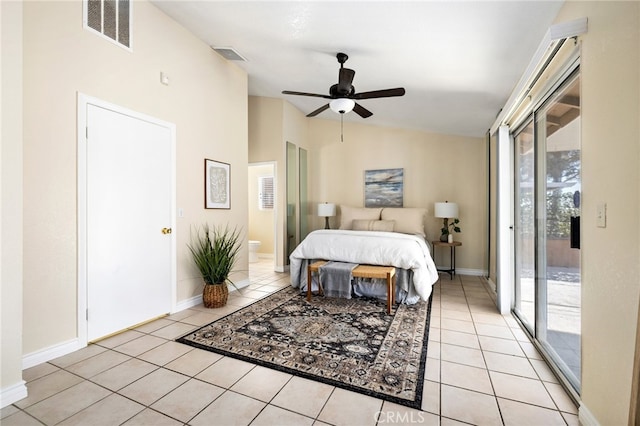 bedroom with ceiling fan, light tile patterned flooring, access to outside, and multiple windows