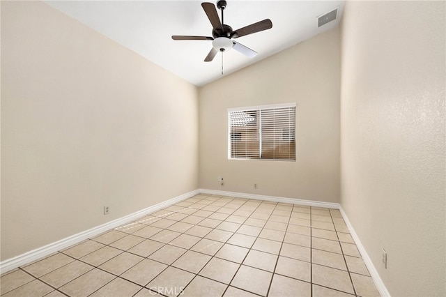 tiled empty room with lofted ceiling and ceiling fan