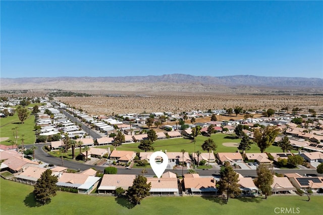 drone / aerial view featuring a mountain view