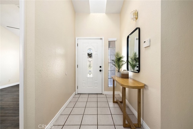 view of tiled foyer entrance