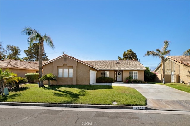 single story home with a front yard