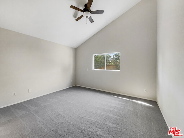 carpeted empty room featuring high vaulted ceiling and ceiling fan