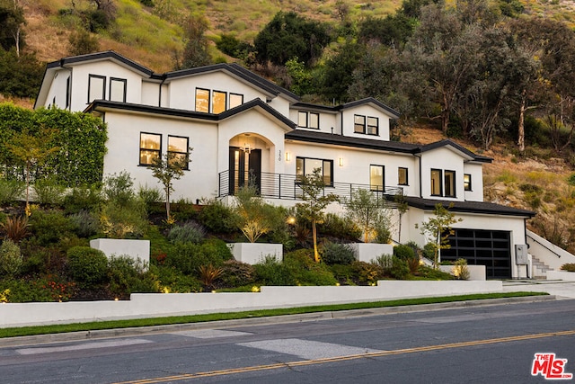 view of front of house with a garage