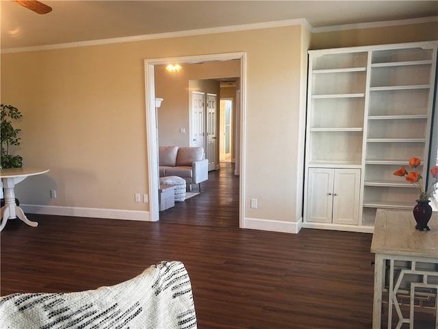 living room featuring ceiling fan, dark hardwood / wood-style floors, and crown molding