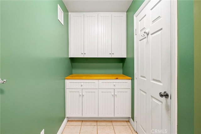 washroom featuring light tile patterned flooring