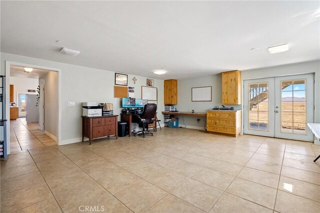 office area with french doors and light tile patterned flooring