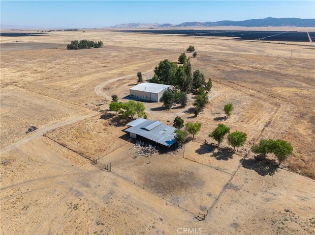 bird's eye view with a mountain view and a rural view