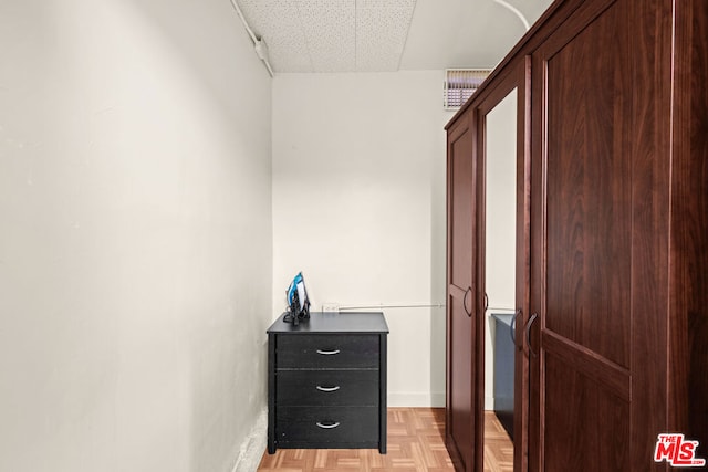 hallway with light parquet flooring