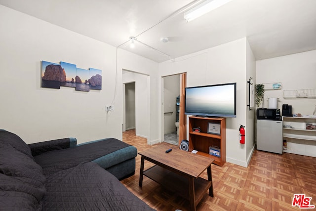 living room with light parquet flooring