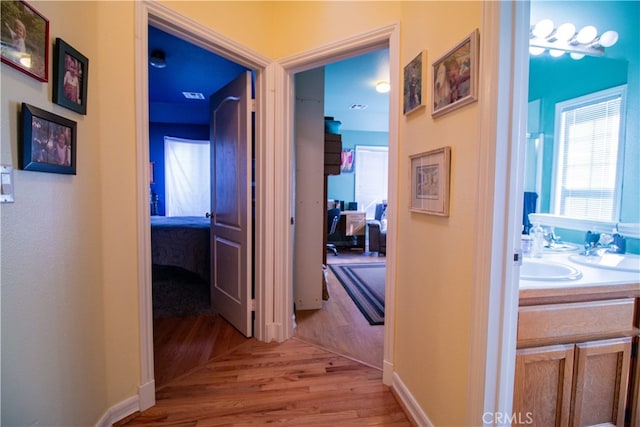 hallway featuring light hardwood / wood-style floors