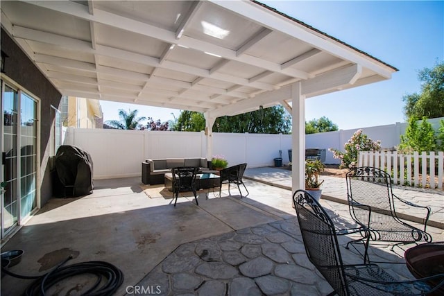 view of patio featuring an outdoor living space and grilling area
