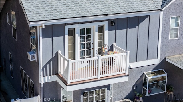 exterior space featuring a balcony and cooling unit