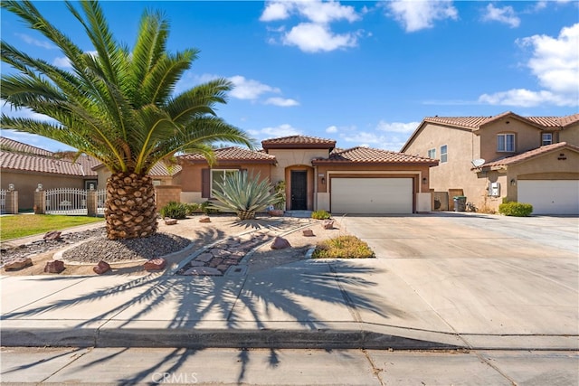 mediterranean / spanish-style house featuring a garage