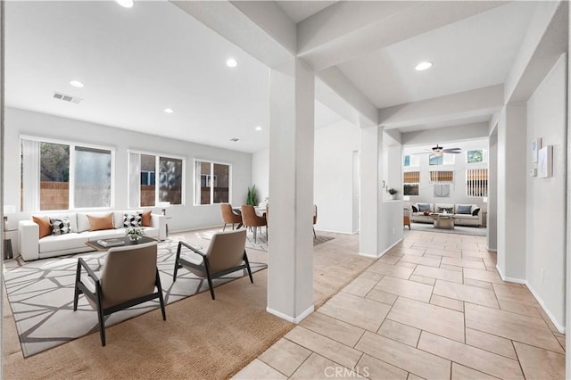 interior space featuring ceiling fan