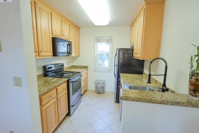 kitchen with sink, stainless steel appliances, light brown cabinets, light tile patterned floors, and light stone countertops