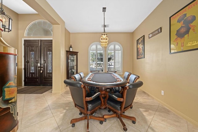 dining space with light tile patterned floors