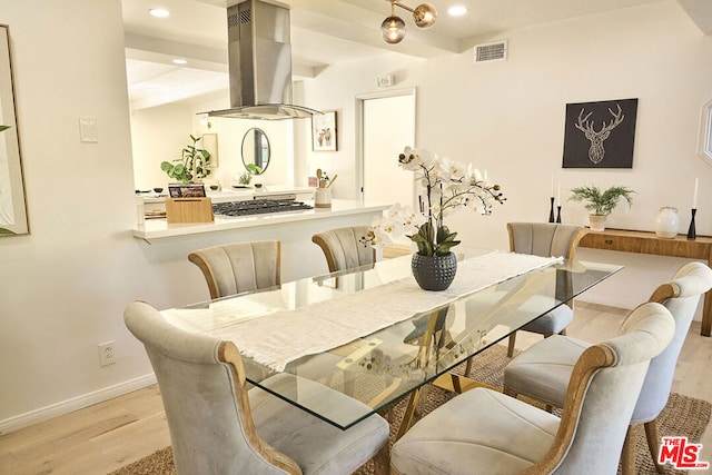 dining space featuring light hardwood / wood-style flooring