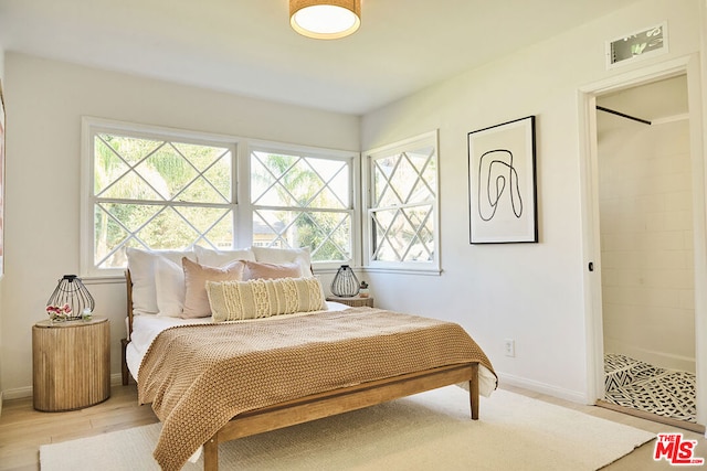 bedroom featuring light hardwood / wood-style flooring