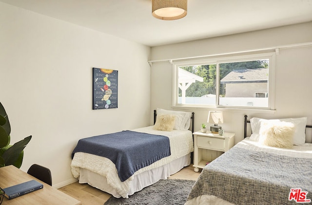 bedroom featuring light wood-type flooring