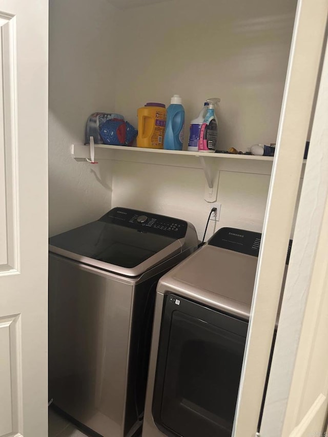 laundry area featuring washing machine and dryer