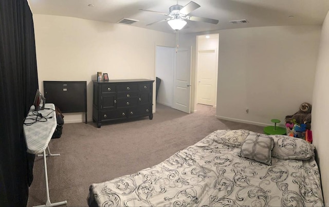 bedroom with ceiling fan and carpet flooring