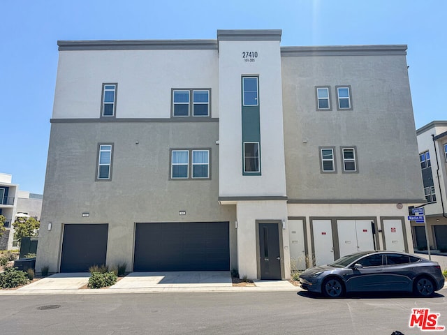 view of property featuring a garage