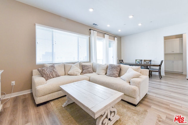 living room featuring light wood-type flooring