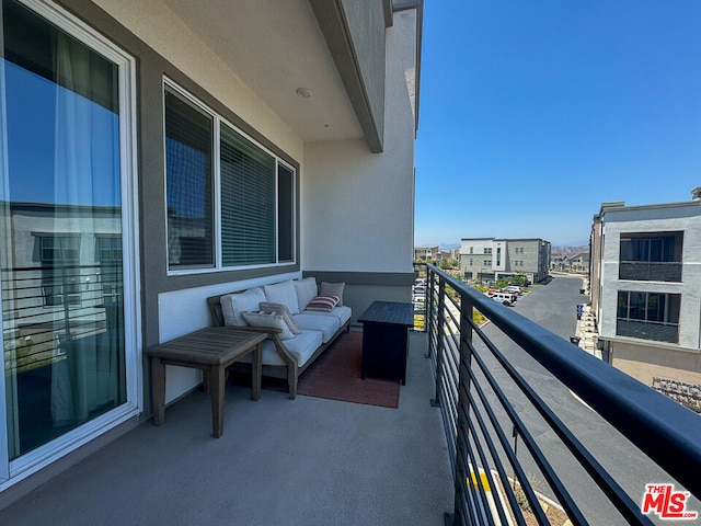 balcony featuring outdoor lounge area