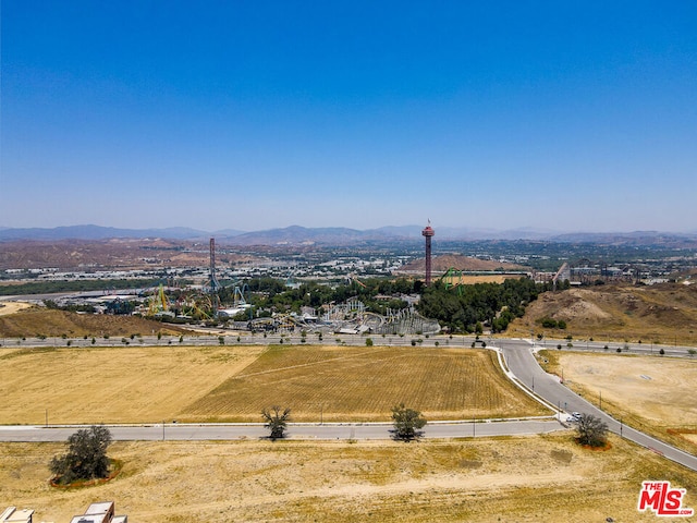 bird's eye view featuring a rural view and a mountain view