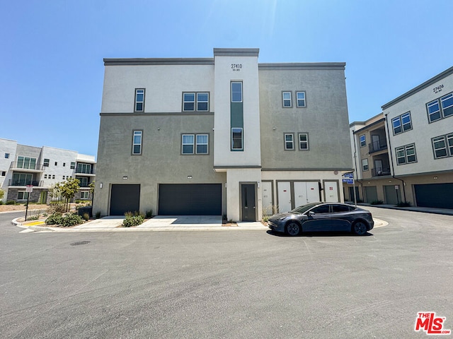 view of property featuring a garage