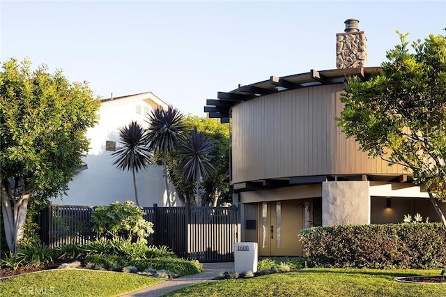 contemporary house with a front yard