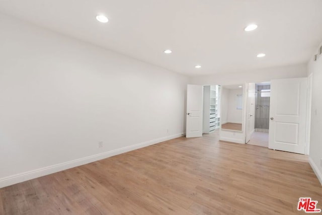 unfurnished bedroom featuring light hardwood / wood-style floors