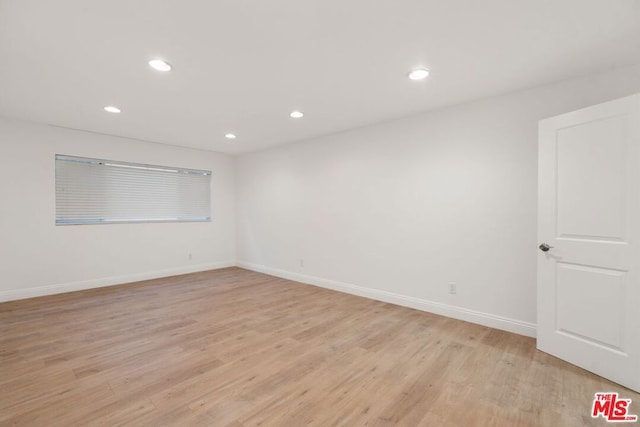 empty room featuring light hardwood / wood-style flooring