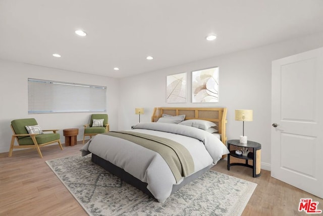 bedroom featuring light wood-type flooring