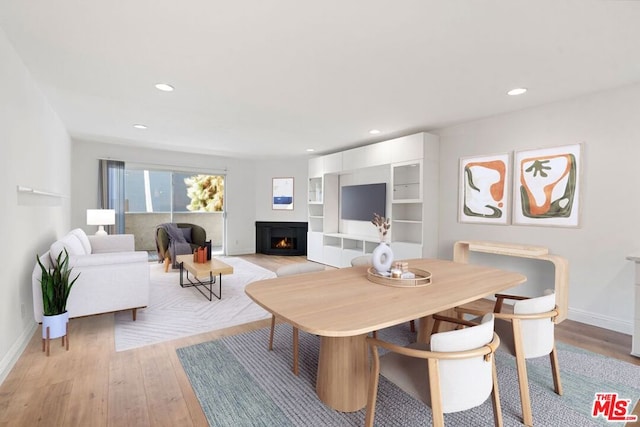 dining room featuring light hardwood / wood-style flooring