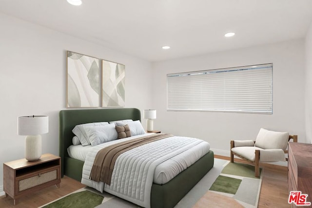 bedroom featuring light wood-type flooring