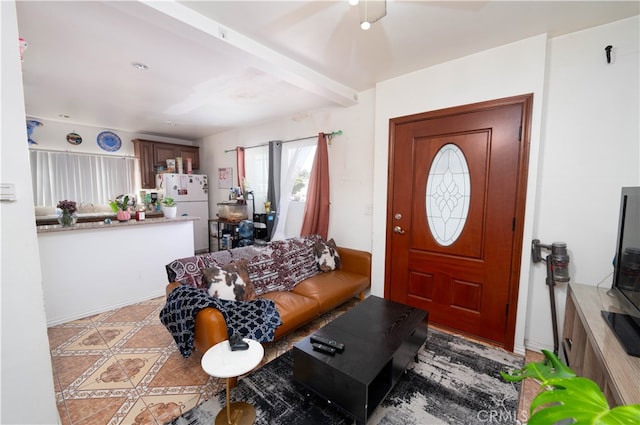 entryway featuring beamed ceiling