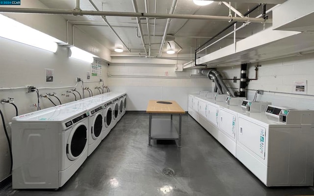 laundry area with separate washer and dryer